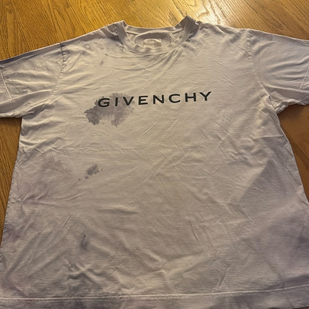 Givenchy t-shirt staining was part of the design never worn.